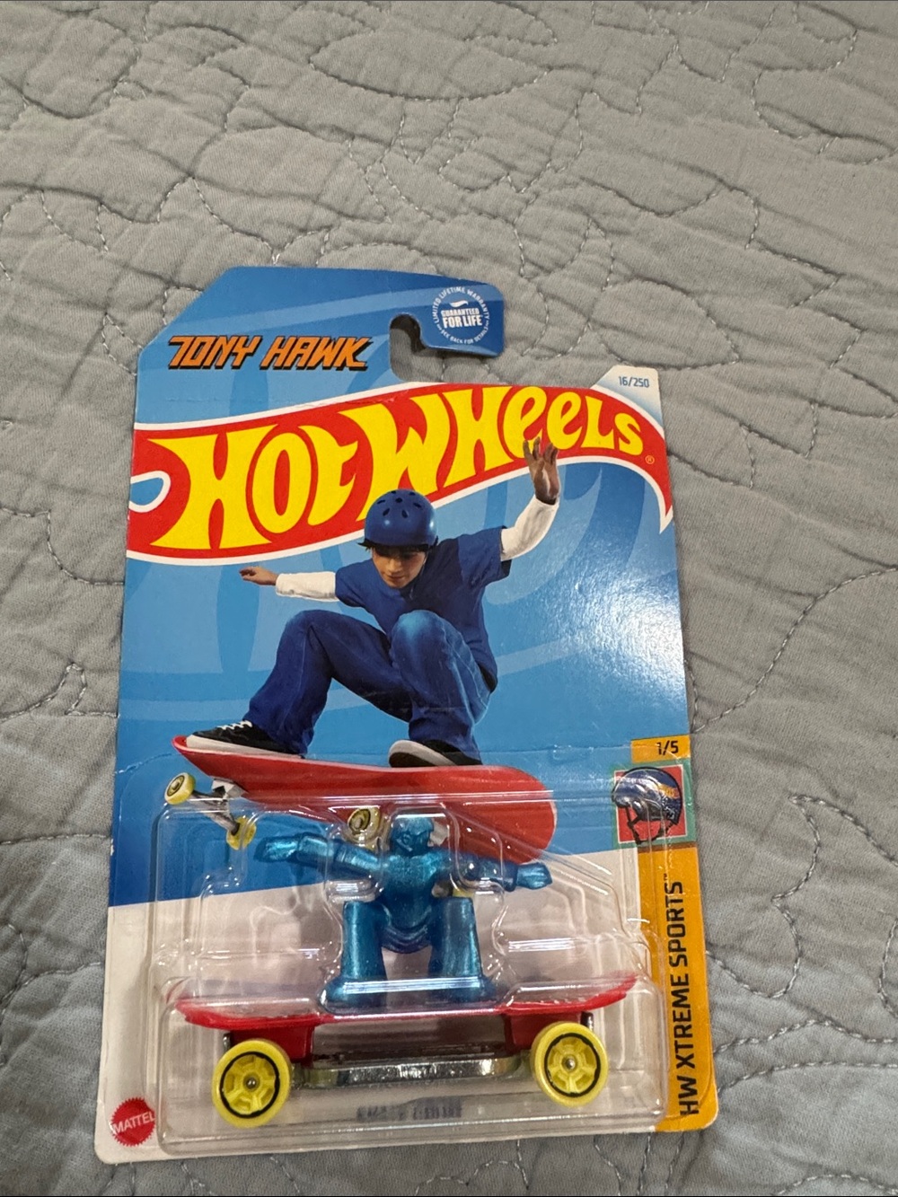 Mattel Hot Wheels Red Skateboard with Blue Metallic Skater